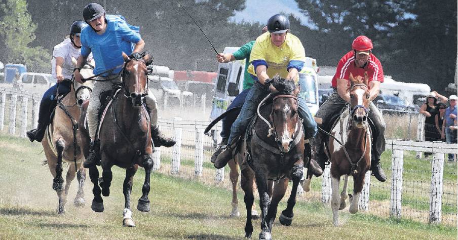 Down the home straight . . . The field heads for home in the second station challenge race at the...