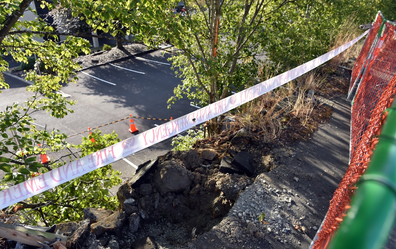 The scene where a vehicle plunged from Stuart St into the parking lot of the Kingdom Hall of...