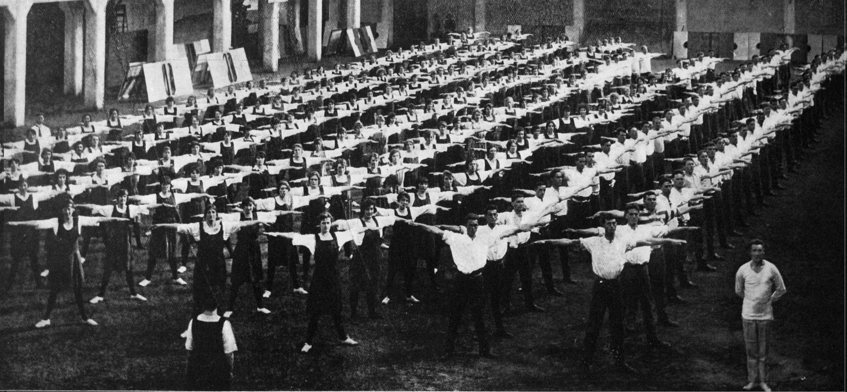 A massed physical training display by students of the Teachers' Training College in Dunedin. —...