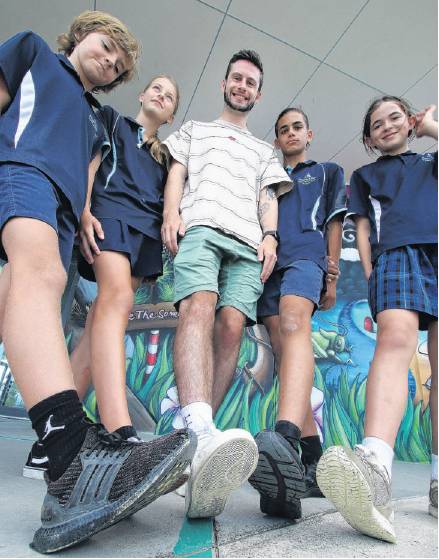 Pegasus Bay team . .. Teacher Dan Perriam with his team Harlan Dunn aged 11 (left), Paige...