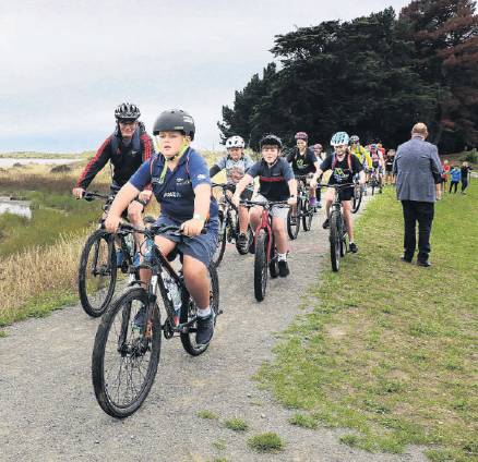 Off they go . . . Henry Lancaster, aged 11 of Rangiora, takes the lead as the cyclists set off on...