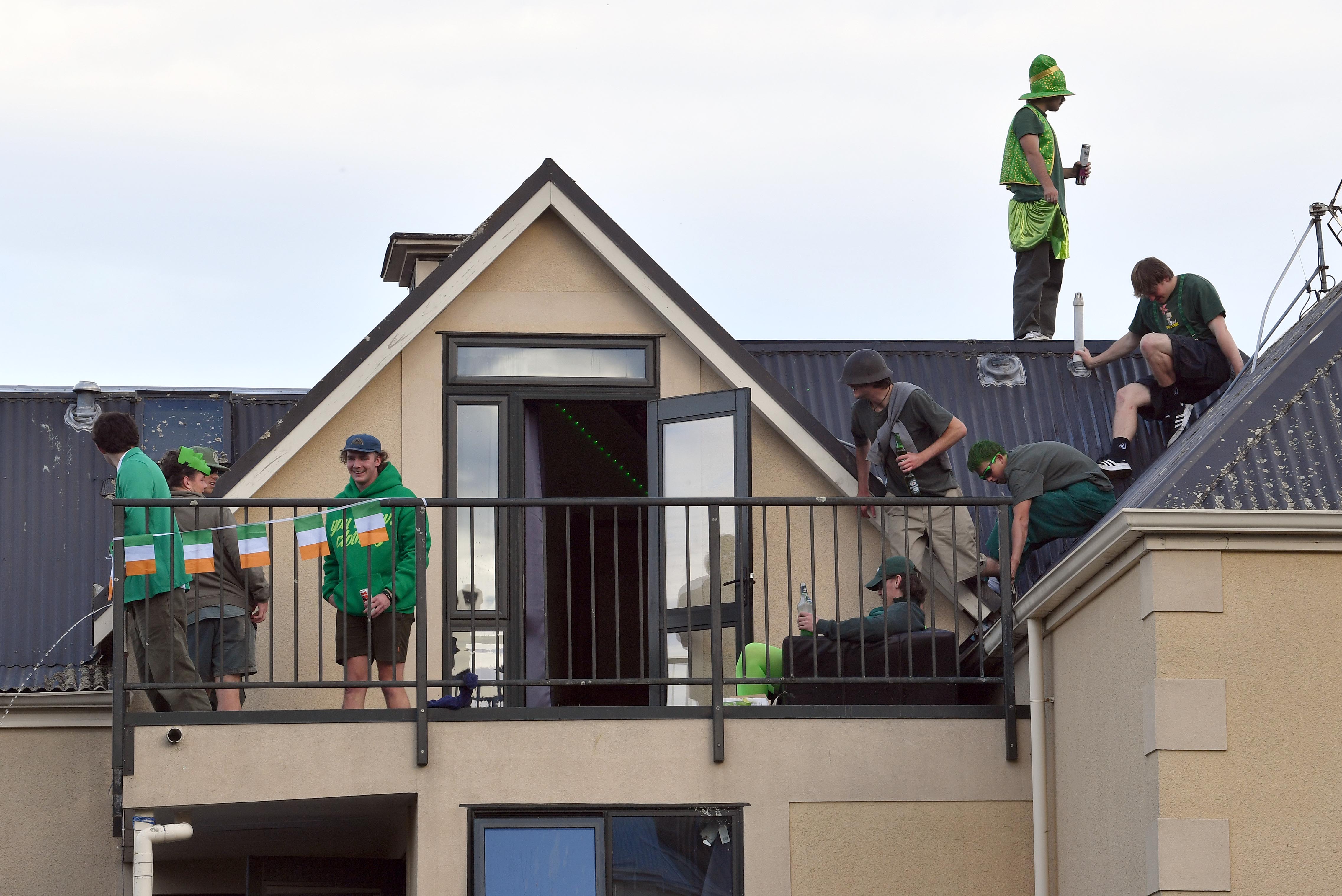 Students on a flat roof in Leith St. Photo: Stephen Jaquiery