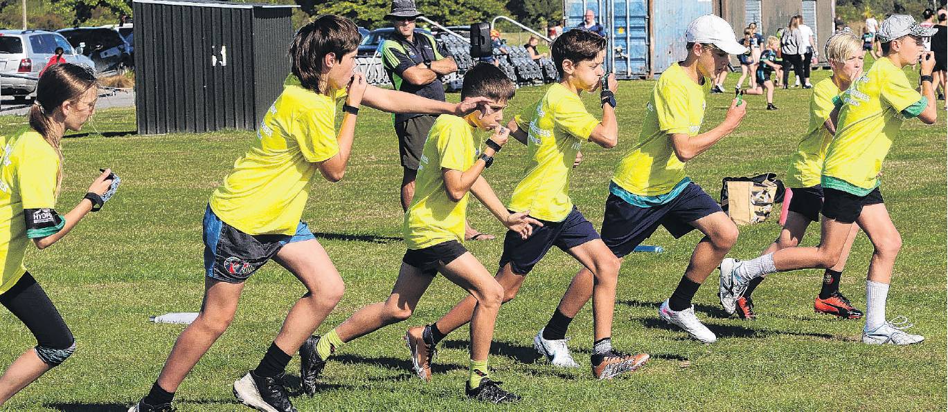 Practising their skills . . . Some of Southbrook Touch’s squad of young referees warming up...