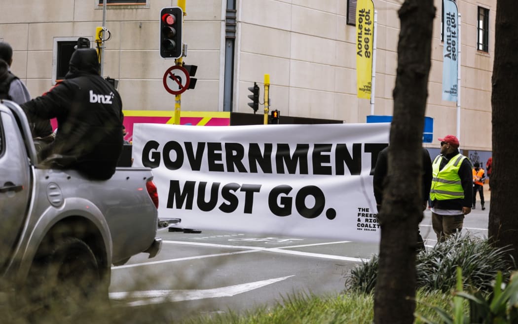 Anti-government protester in Wellington, marching towards Parliament on 23 August 2022. Photo:...