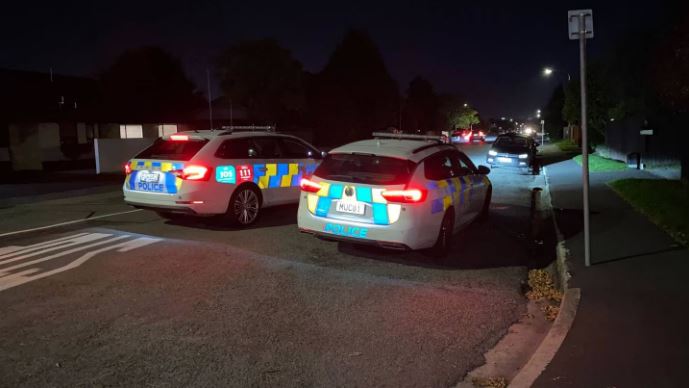 Police and emergency services at the scene in Riccarton. Photo: Sam Sherwood