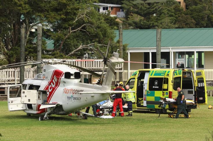 The critically injured skipper is transferred to a Northland Rescue Helicopter on the Paihia...