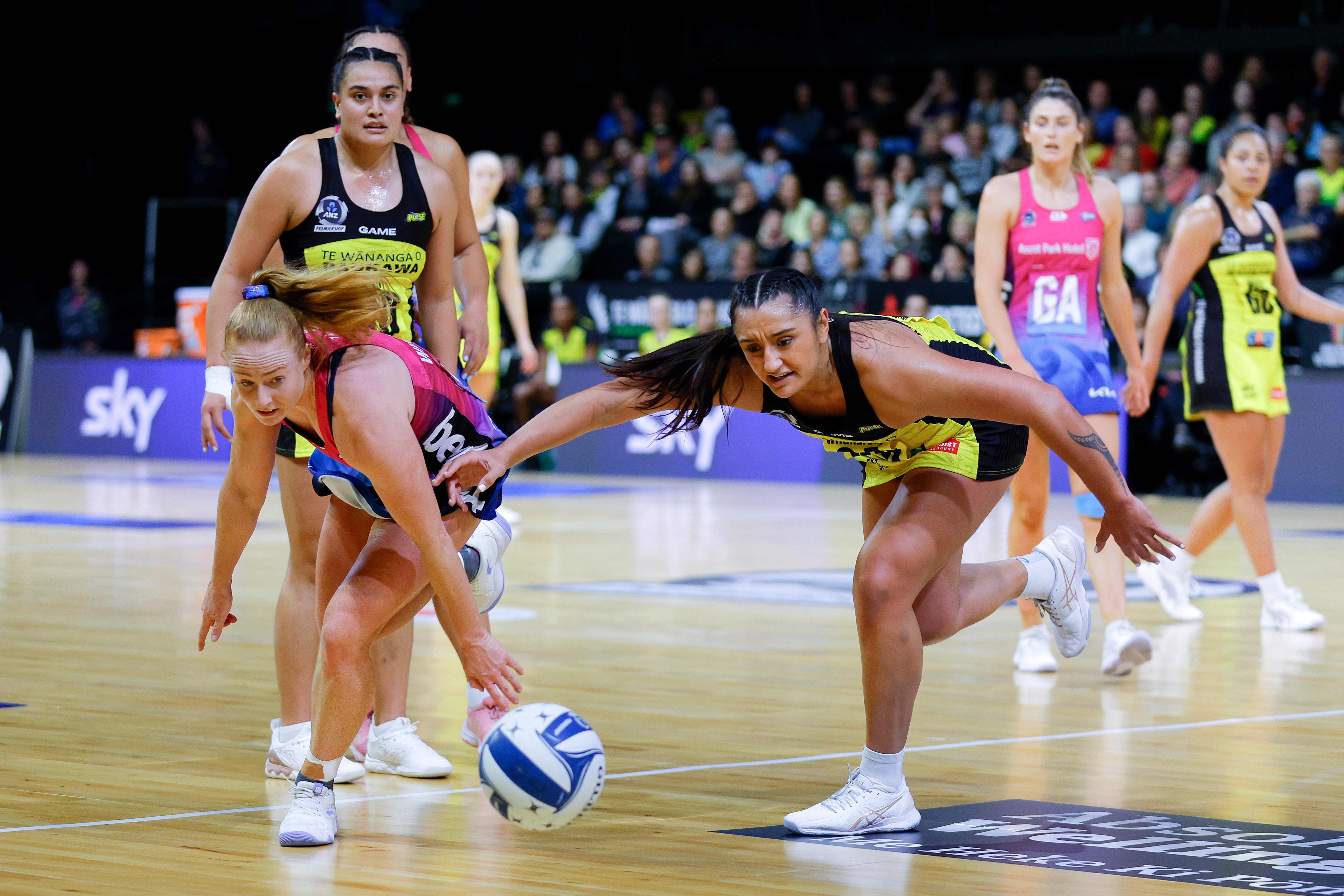 Southern Steel wing defence Sam Winders (left) and Central Pulse goal attack Tiana Metuarau hunt...