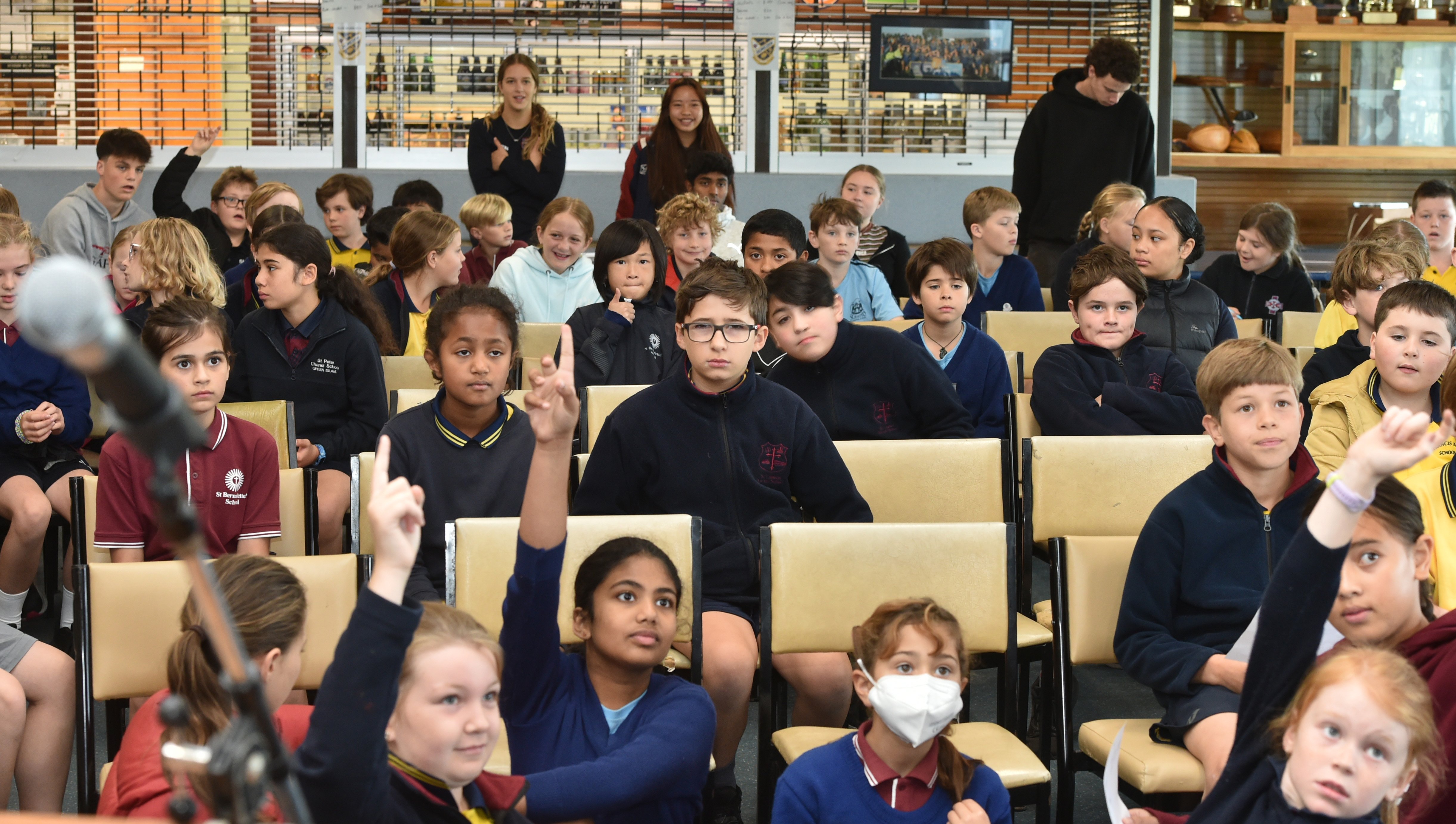 Pupils from various Dunedin Catholic schools brainstorm with Ben Smith at a leadership event...