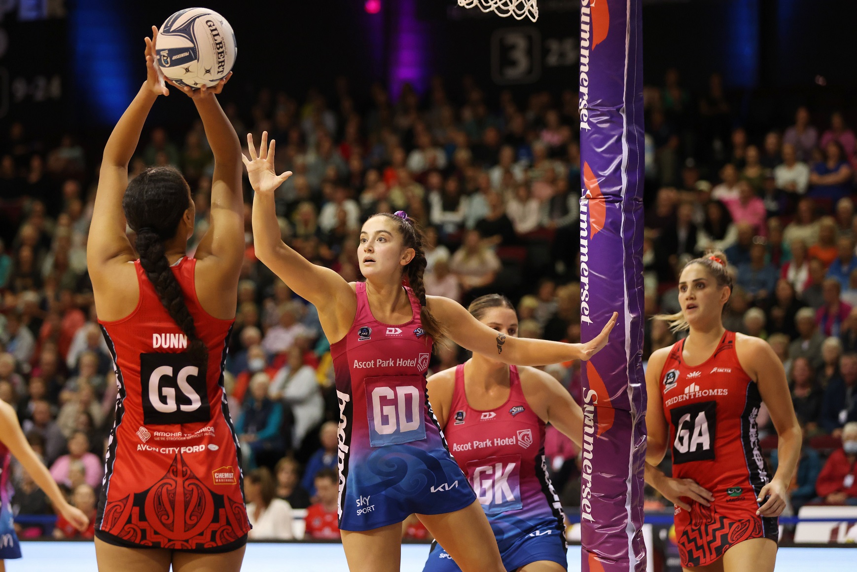 Kate Burley, who was a standout for the Southern Steel, defends the shot of Tactix shooter Aliyah...