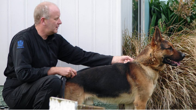 Police dog Gage and his handler Senior Constable Bruce Lamb, who died on Tuesday. Photo: Supplied