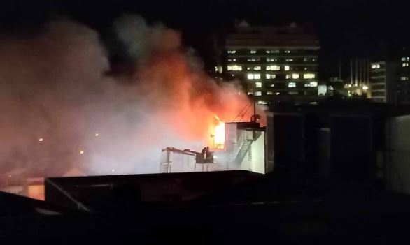 Flames could be seen shooting from Loafers Lodge in Wellington during the fatal blaze. Photo:...