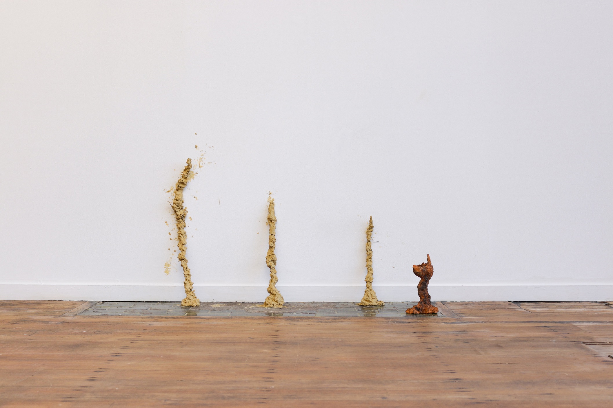 Lucy Hill’s 295 (2023), created from Ōpoho Rd clay, twigs, rainwater. Photo: Blue Oyster Art...