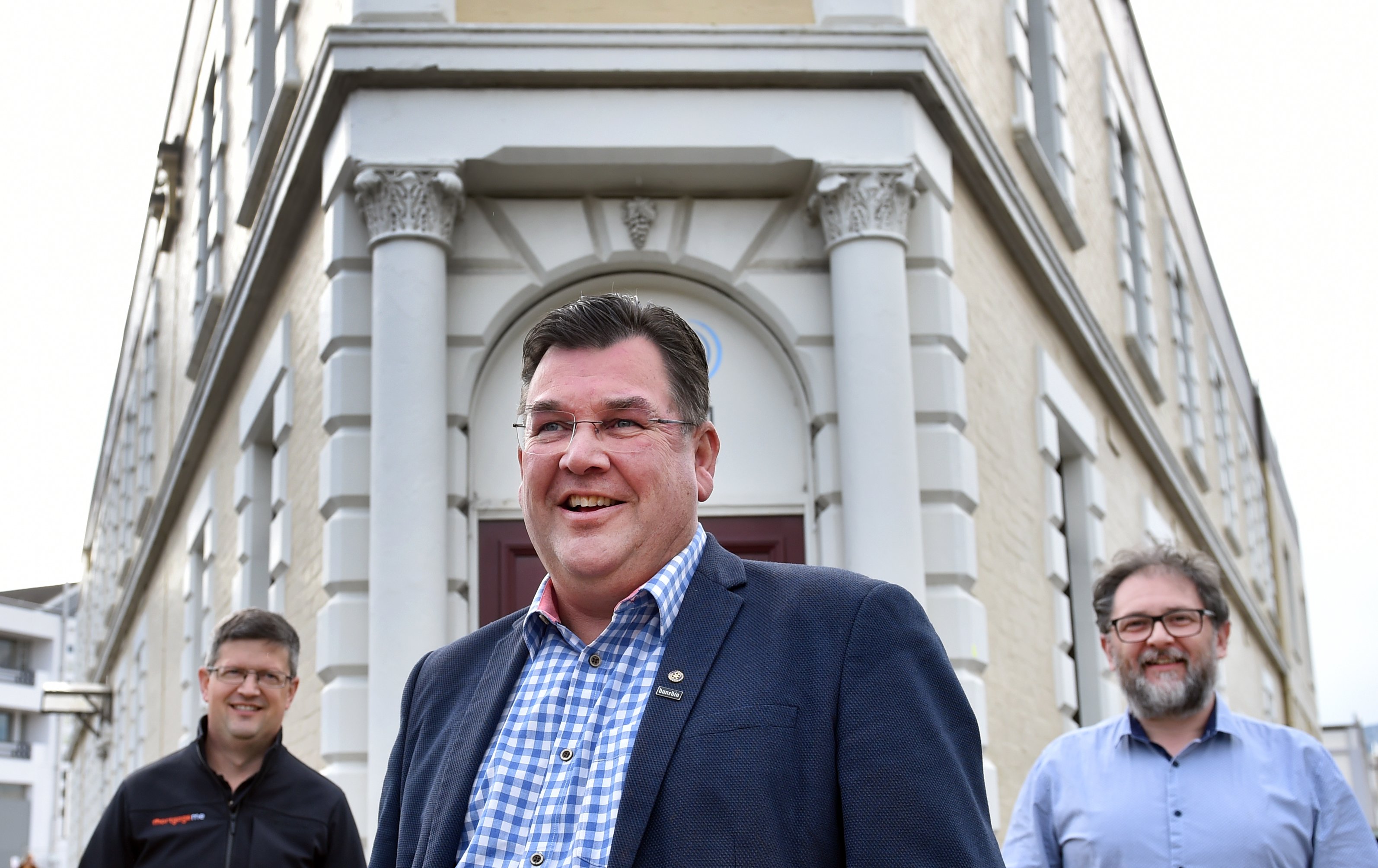 Ready to farewell the Dunedin Community House building are (from left) organisation treasurer...