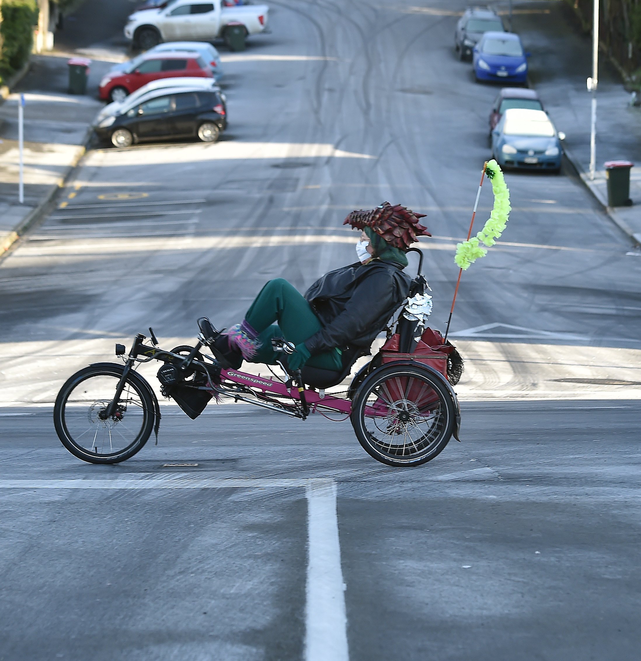 A cyclist rides a recumbent tricycle along a frosty George St on Saturday morning. PHOTO: PETER...