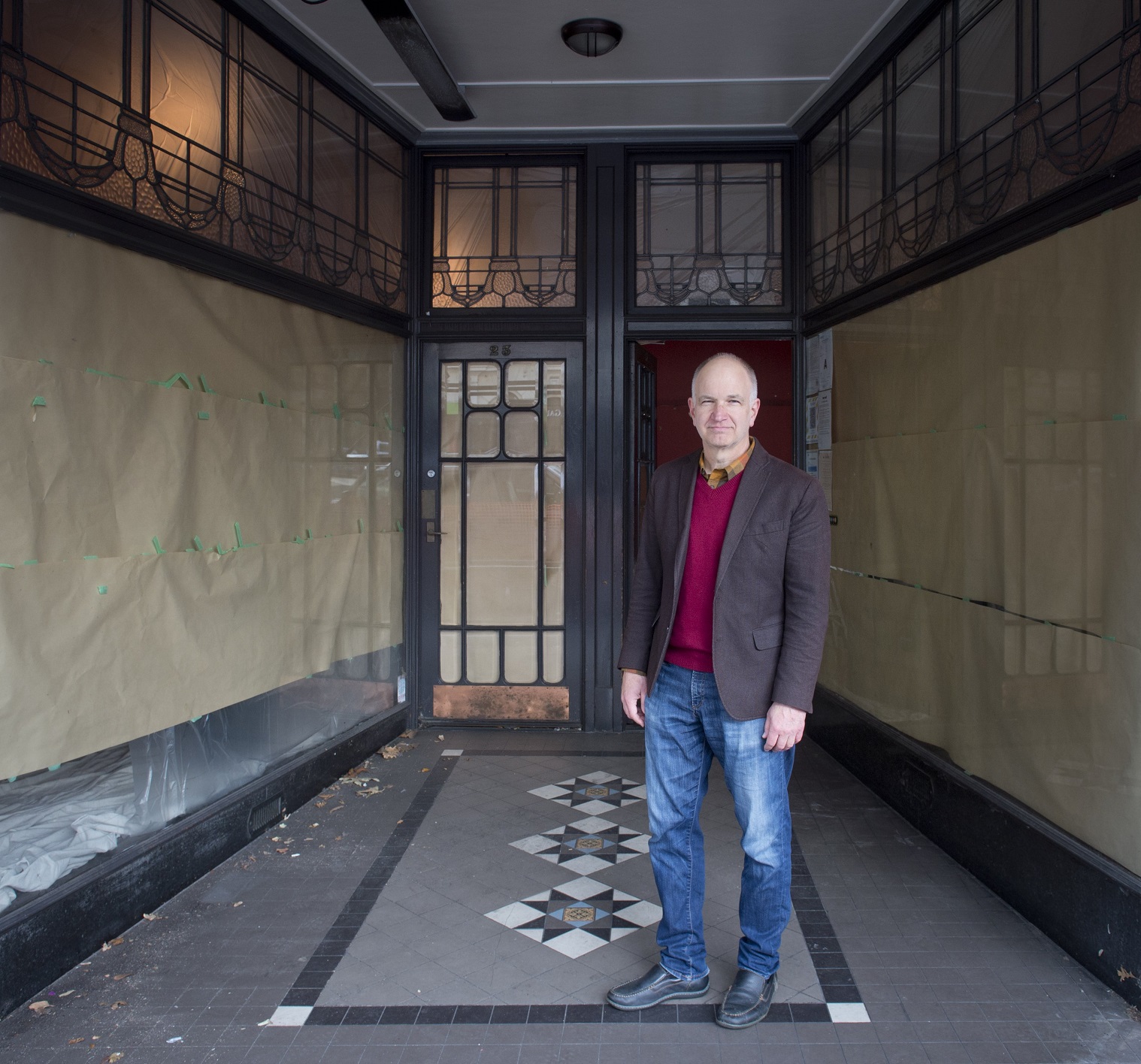 Thomas McLean stands in the doorway of what was Modern Books in Moray Pl, where Rona Dyer painted...