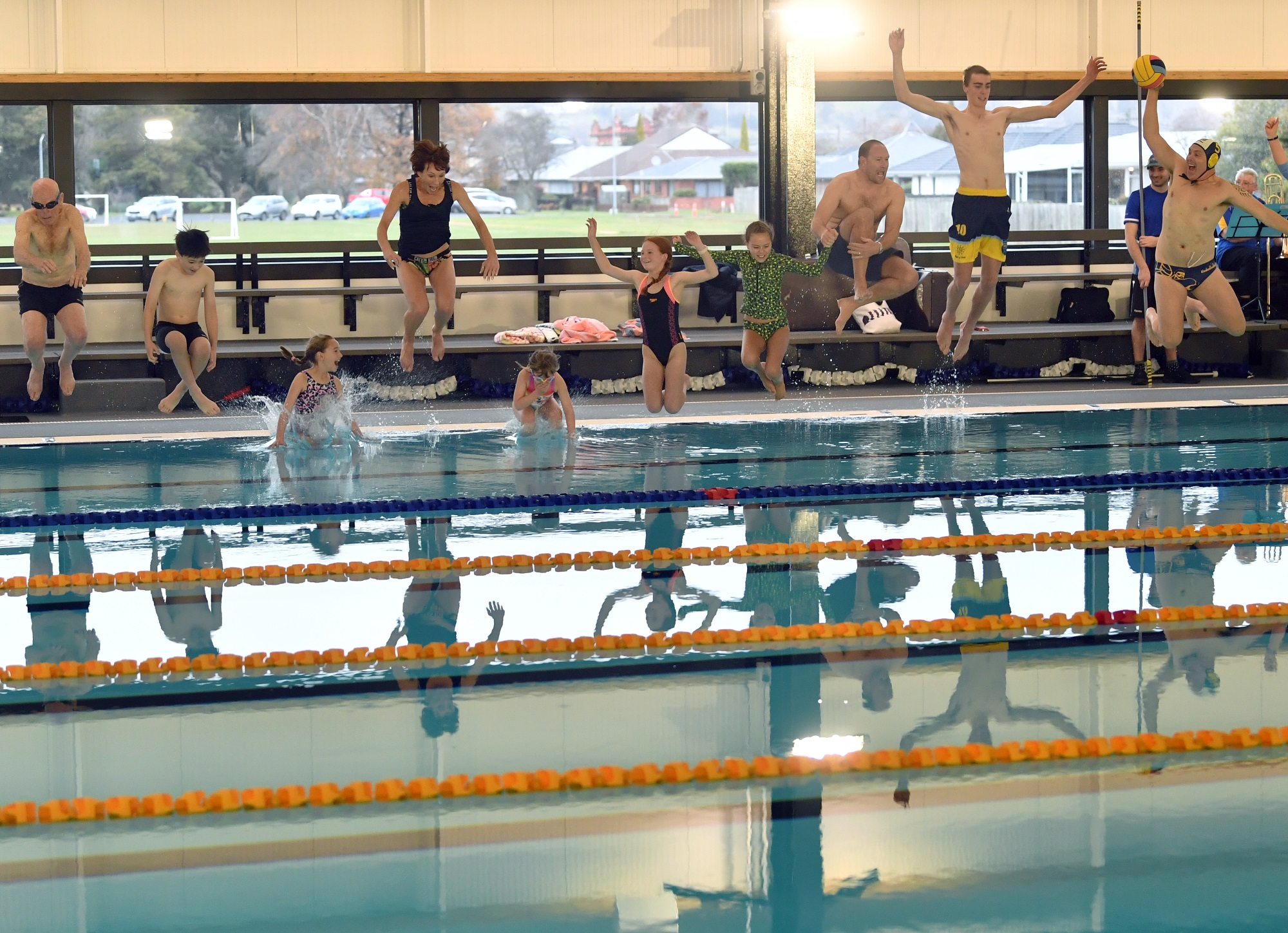 Trying the  new lap pool out this morning are, from left: Brian O'Brien, Lennox Nitis, Ebony...