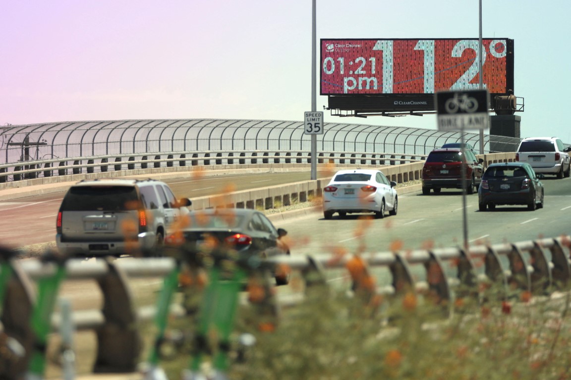 A billboard displays the temperature as Phoenix, Arizona breaks its heat record of consecutive...