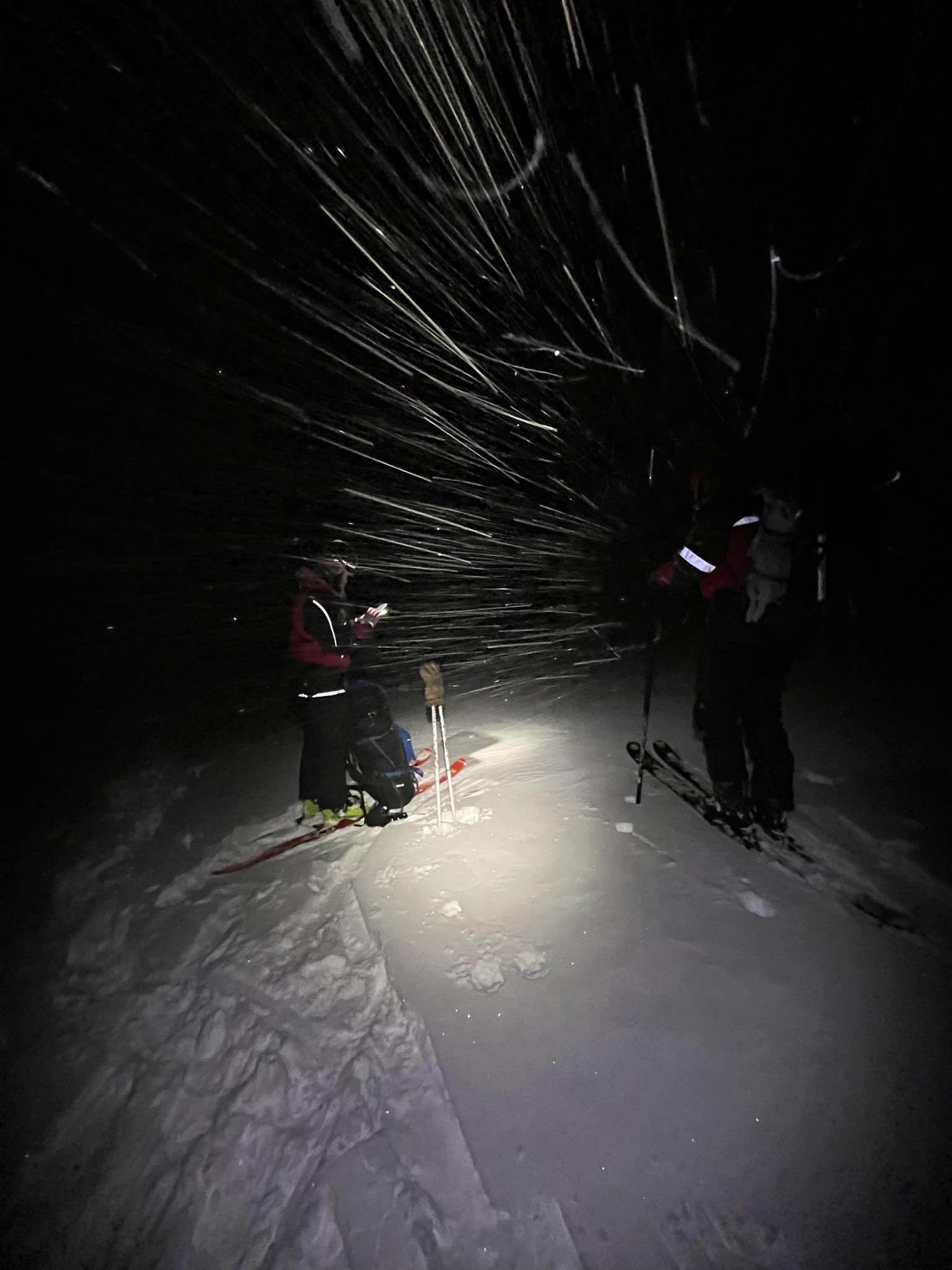 Queenstown Alpine Cliff Rescue teams pictured in near whiteout conditions during the rescue....