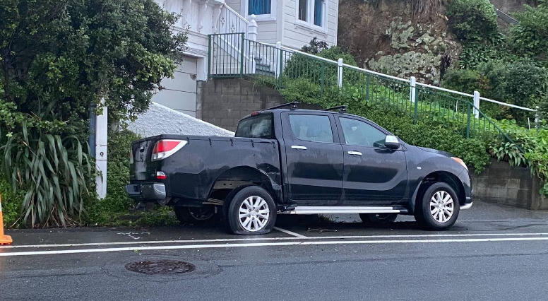 Damage can be seen on the ute parked in Evans Bay Parade. Photo: Nick James