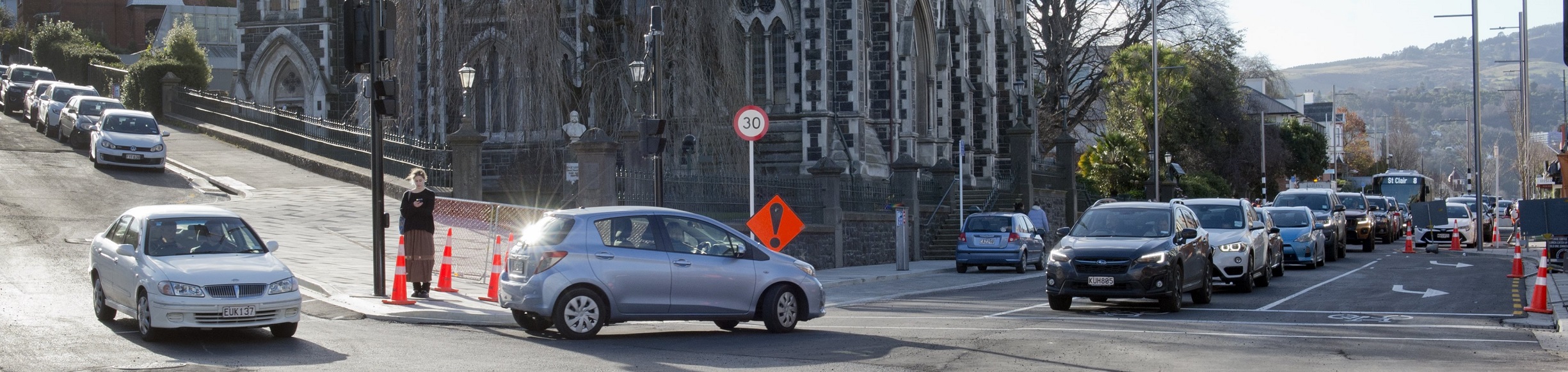 A car turns left from Pitt St into the reopened Knox block of George St in Dunedin yesterday....