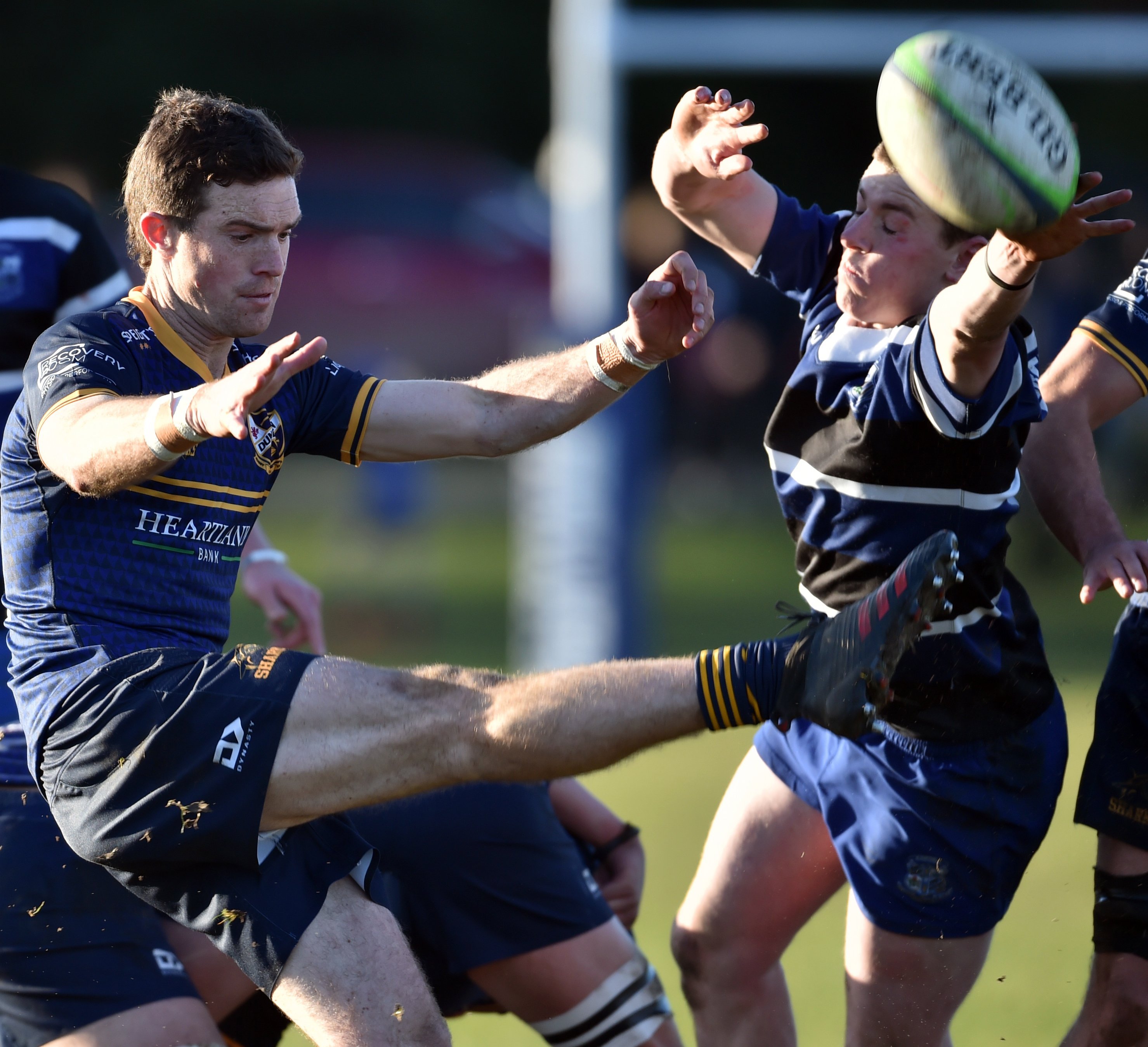 Dunedin halfback Tim Hogan clears the ball during the semifinal against at Kaikorai.