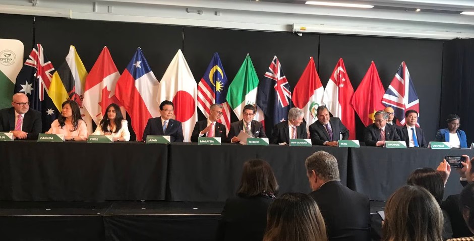 CPTPP ministers in Auckland shortly before signing the UK into the free trade agreement, with UK...