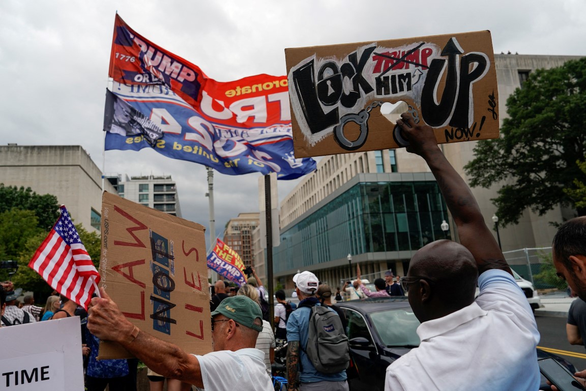 Demonstrators and counter-demonstrators gather in Washington ahead of Donald Trump's court...