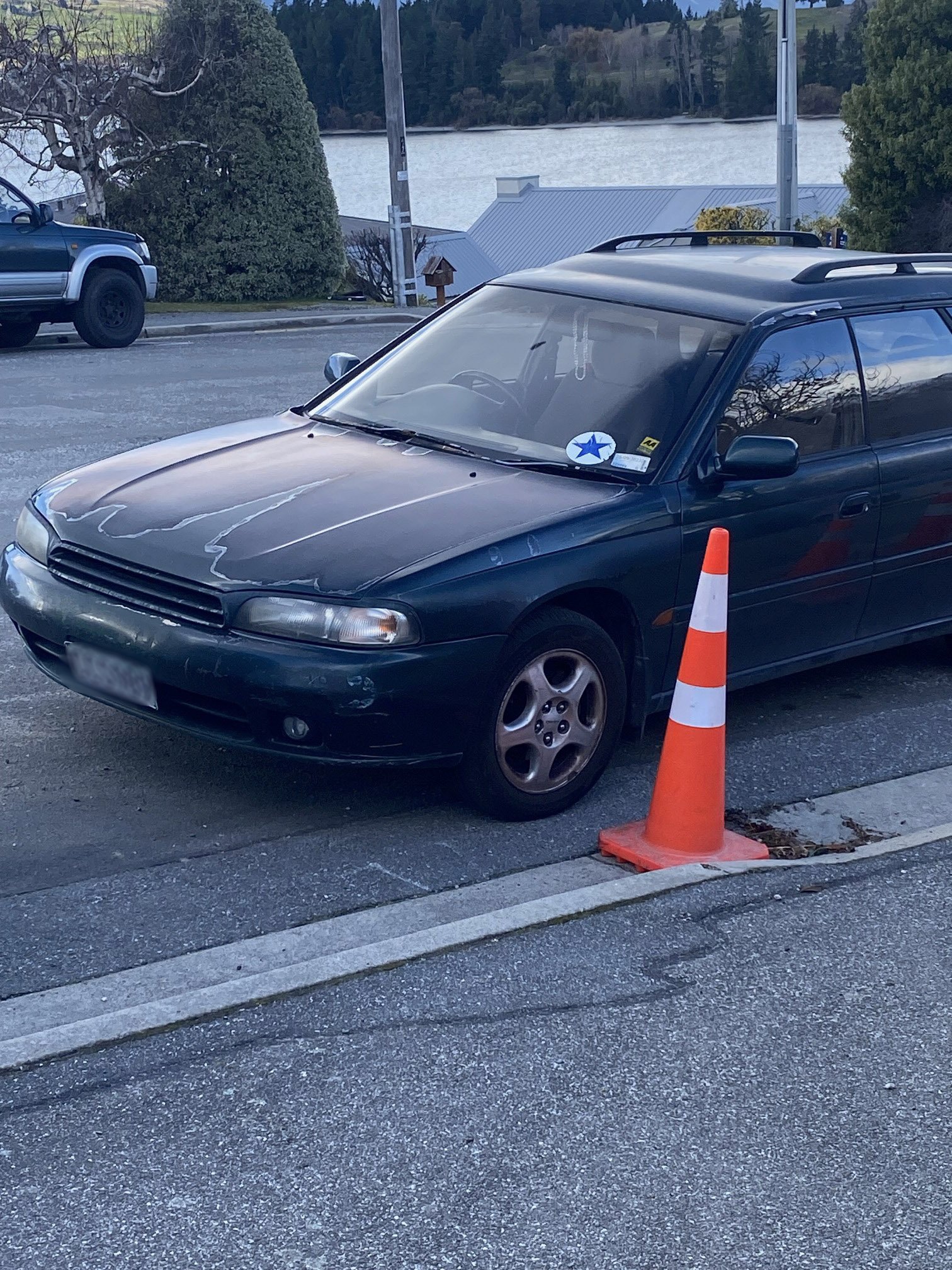 This car was parked illegally across Sue Ross’s driveway entrance for hours. Photo: Supplied 