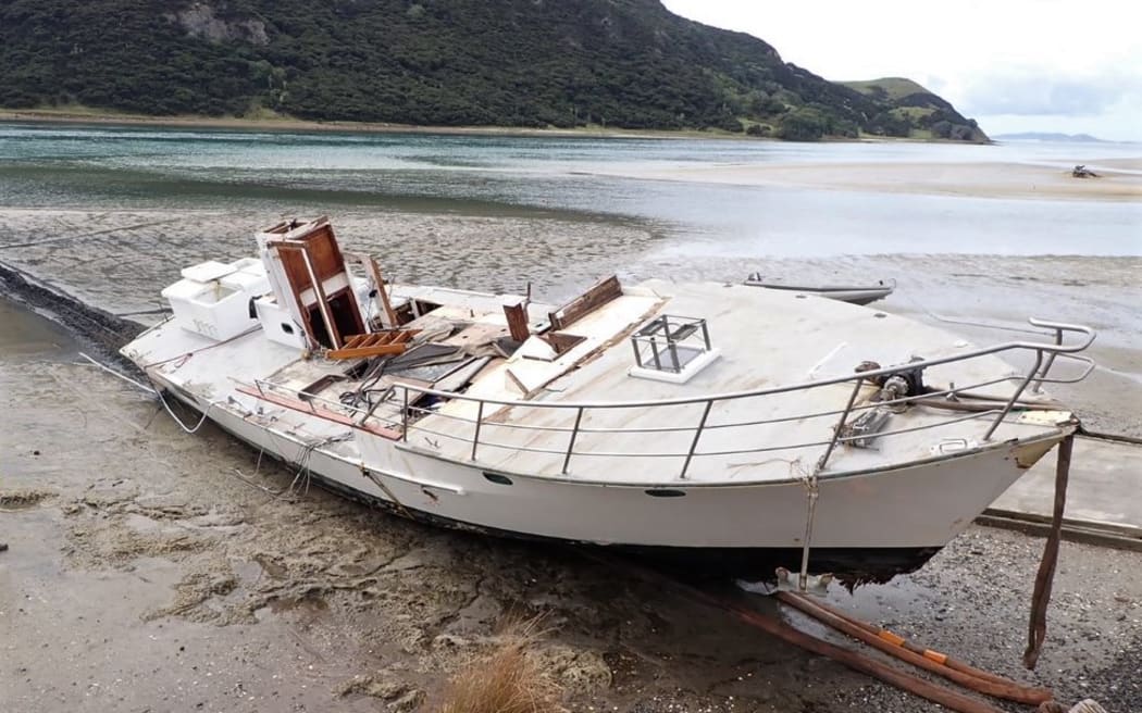 The wreck of the Enchanter on the beach at Houhora Heads, Northland, following the second salvage...