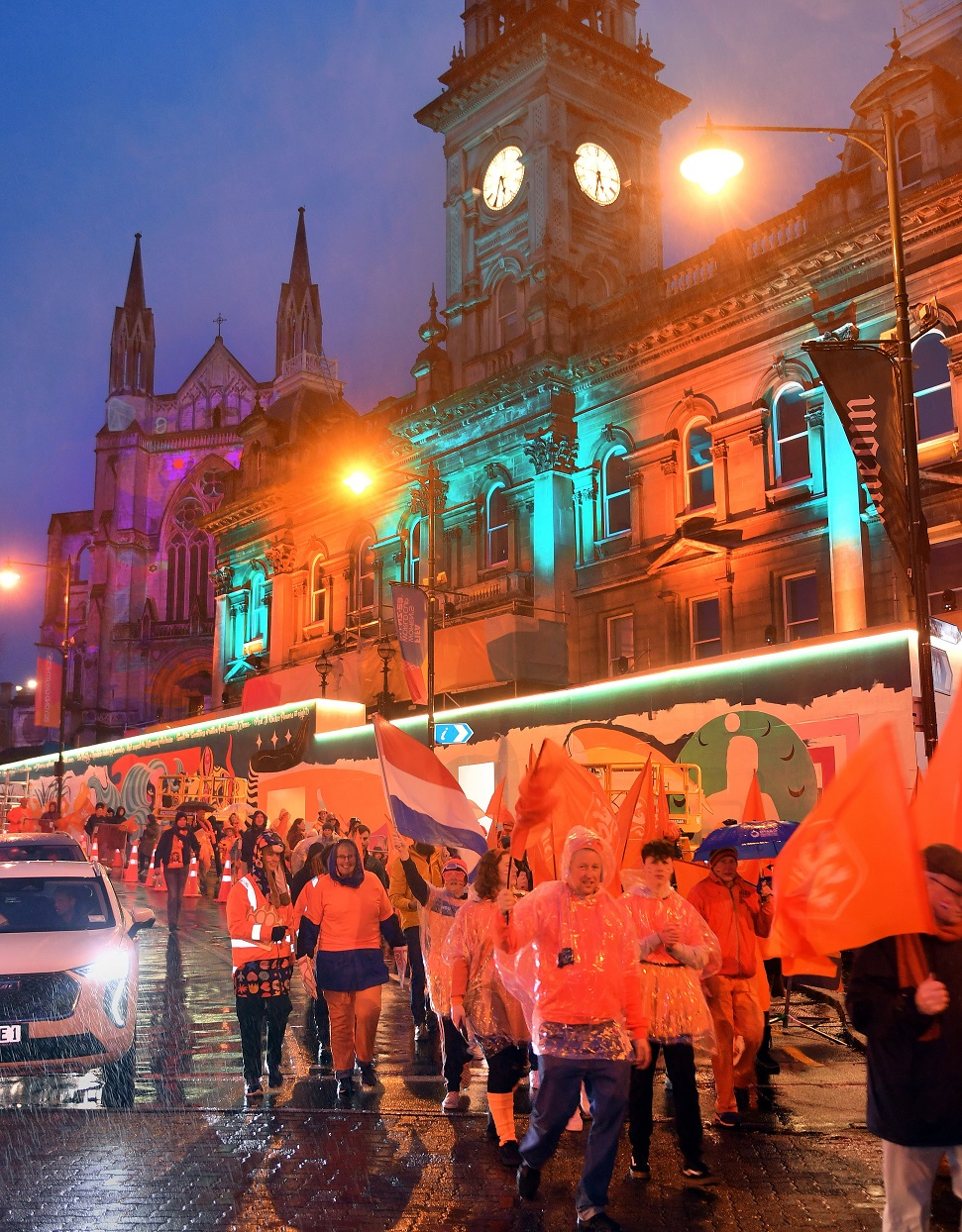 Dutch supporters leave the fan zone beginning their march to Forsyth Barr Stadium to cheer on...