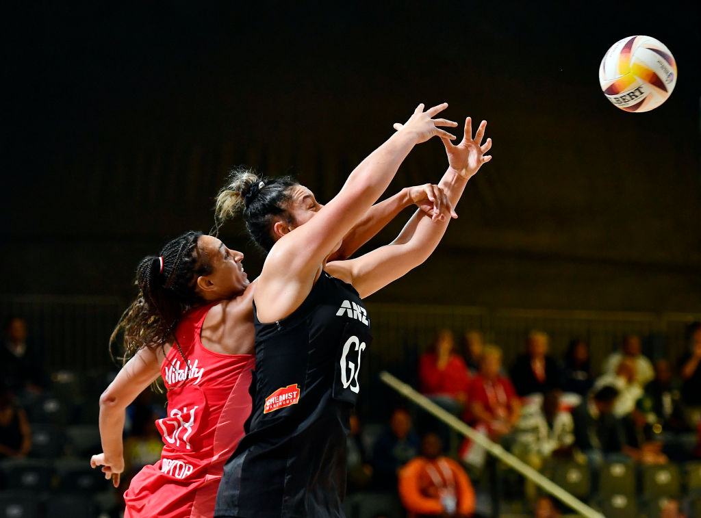 England' Geva Mentor and Silver Fern Maia Wilson compete for the ball. Photo:  Getty Images 