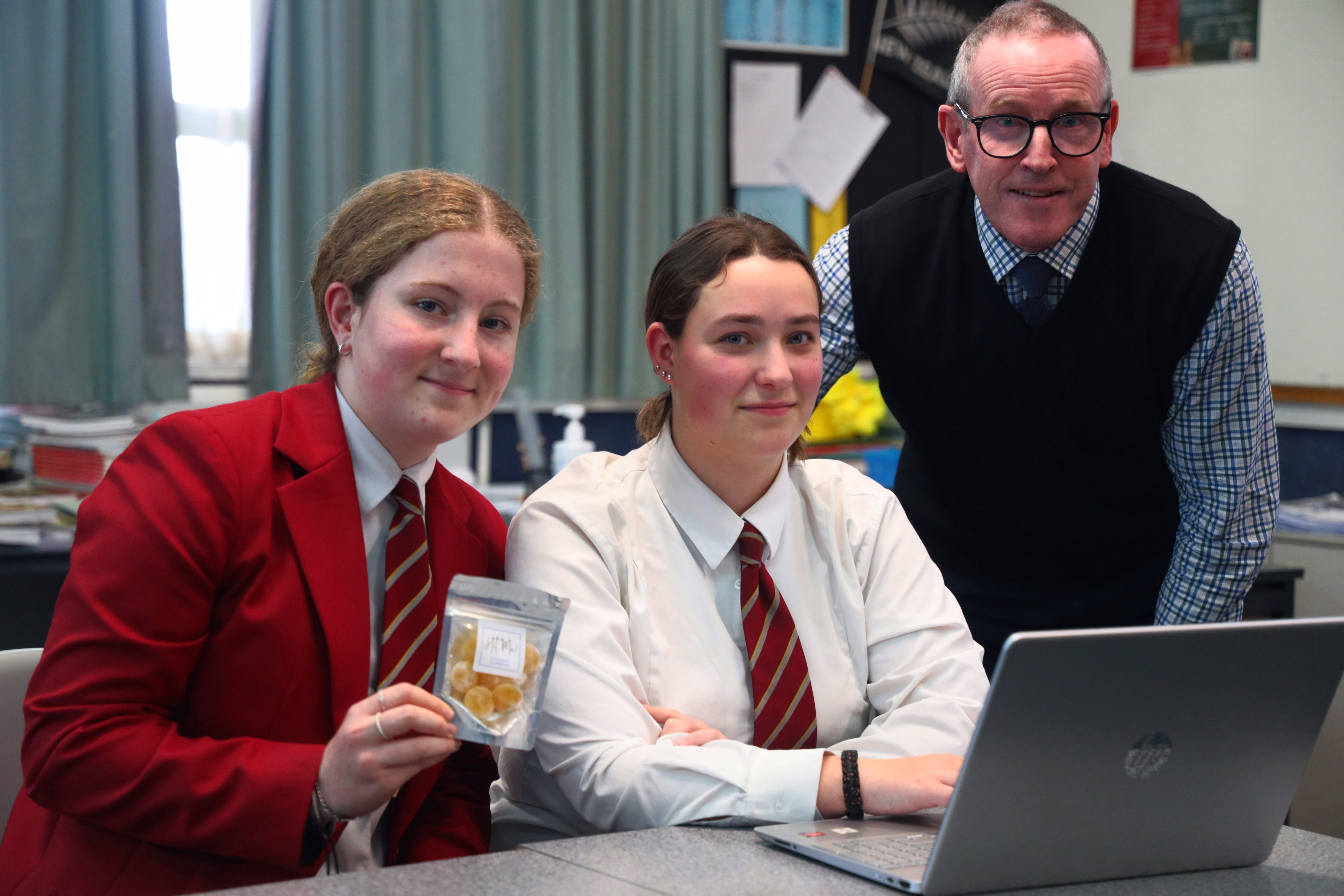 James Hargest College pupils Tess McGregor (left) and Abigail Bragg discuss marketing strategies...