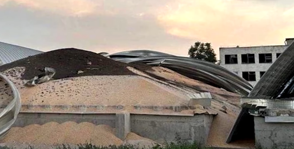 Grain spills out of a wrecked silo at the port of Izmail, the main alternative route out of...