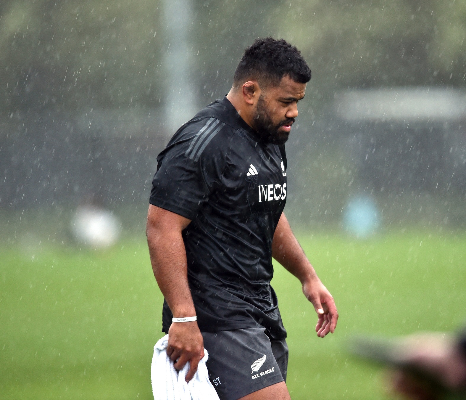 All Blacks hooker Samsoni Taukei’aho finishes the captain’s run during a downpour at Logan Park...