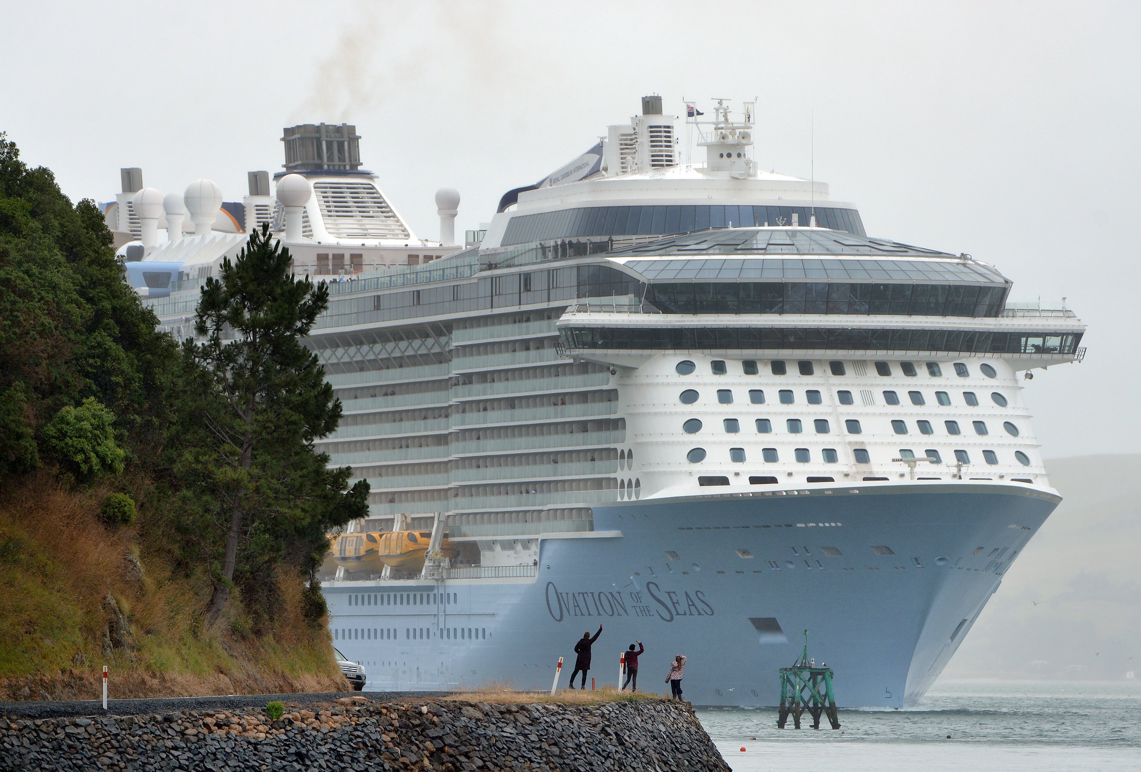 The Ovation of the Seas cruise ship makes its way up Otago Harbour towards Port Chalmers during...