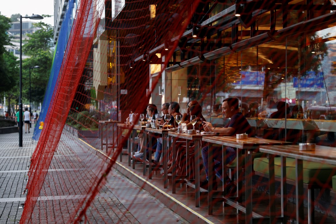 Nets are installed outside a restaurant in Hong Kong in anticipation of Super Typhoon Saola....