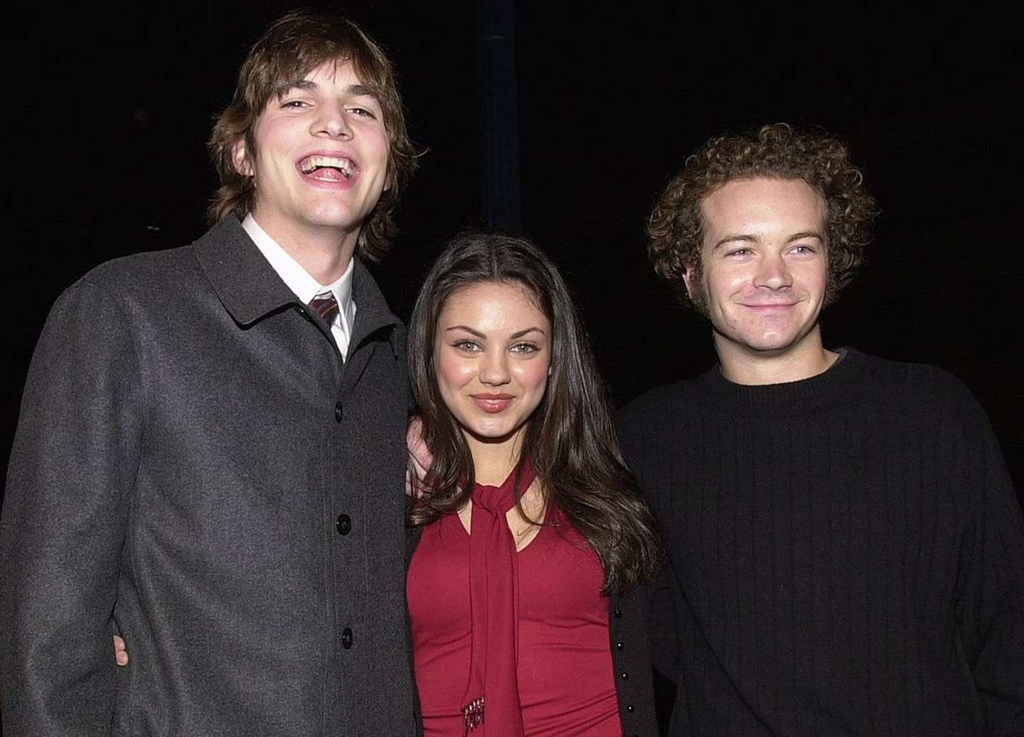 That 70's Show cast members Ashton Kutcher, Mila Kunis and Danny Masterson arrive at the premiere...