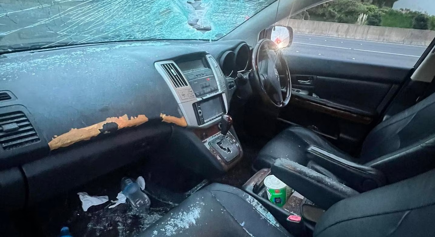 The inside of the car after the pole fell on it. 