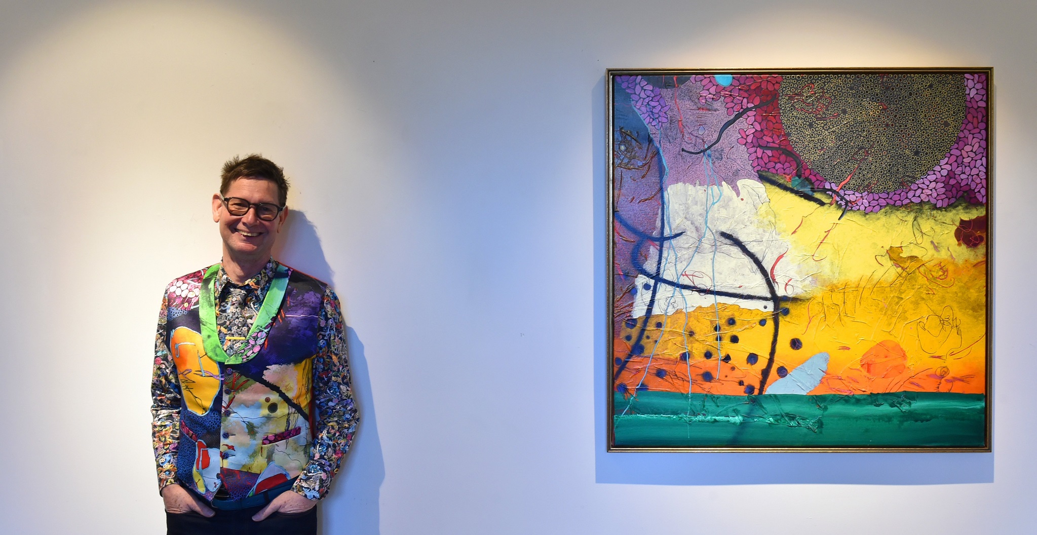 Evan Woodruffe likes to take his art with him in his clothing as well as hang it on the wall....