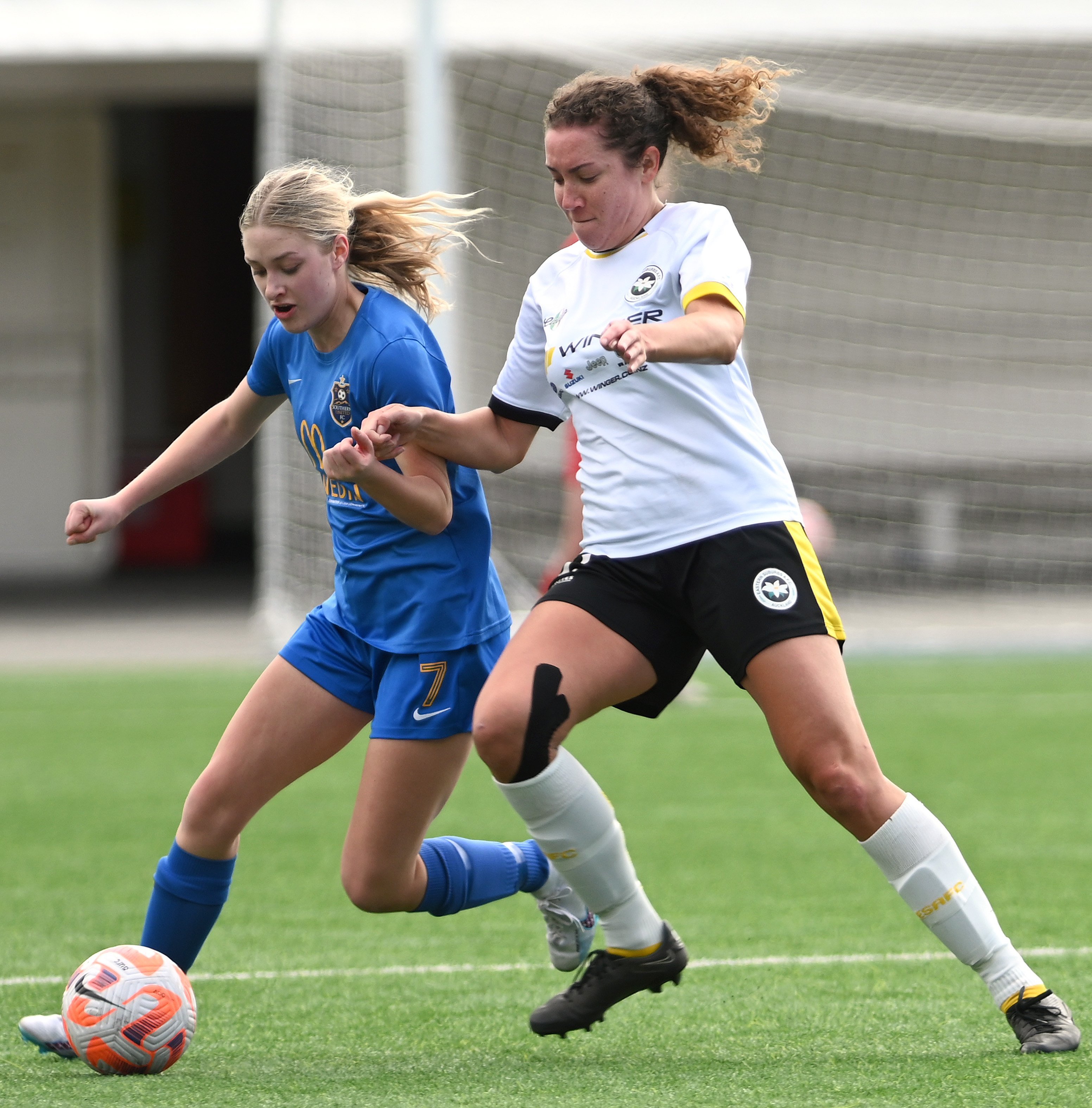 Southern United midfielder Abby Rankin tries to beat Eastern Suburbs defender Kenya Brooke on the...