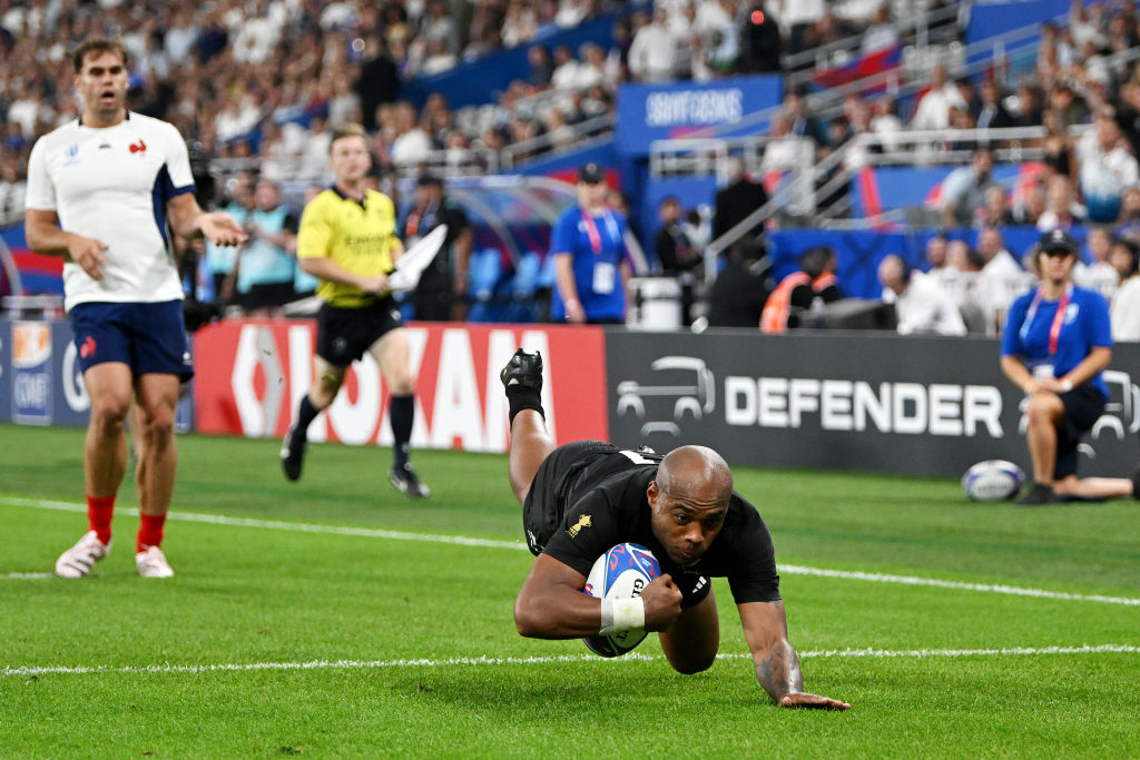 Mark Telea dives over to score the All Blacks' second try against France. Photo: Getty