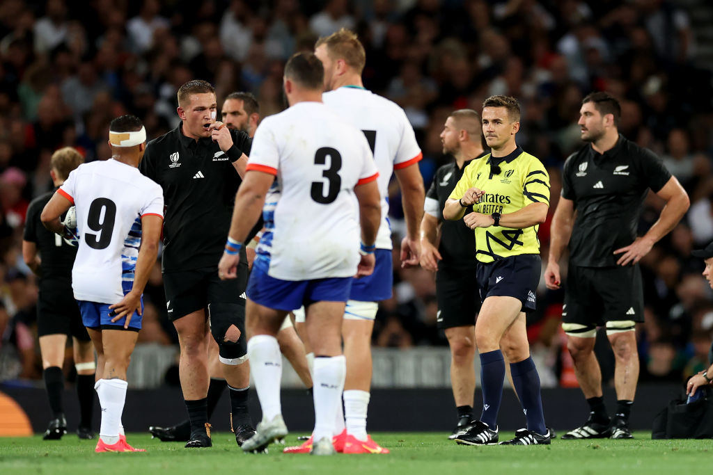 All Black Ethan De Groot (left) received a yellow card that was later upgraded to red. Photo:...