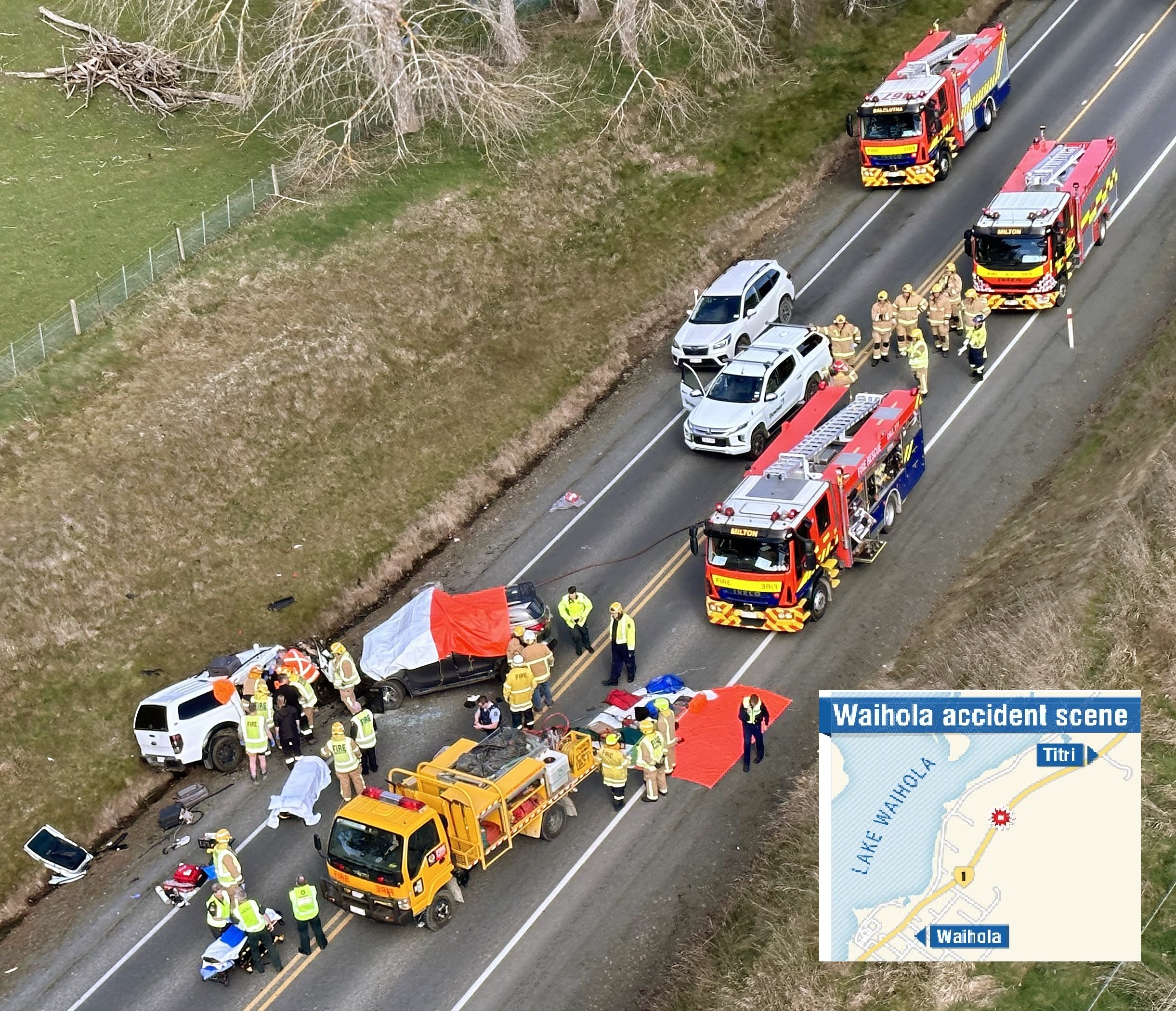 Emergency services work at the scene of a crash in the southbound lane of State Highway 1 north...