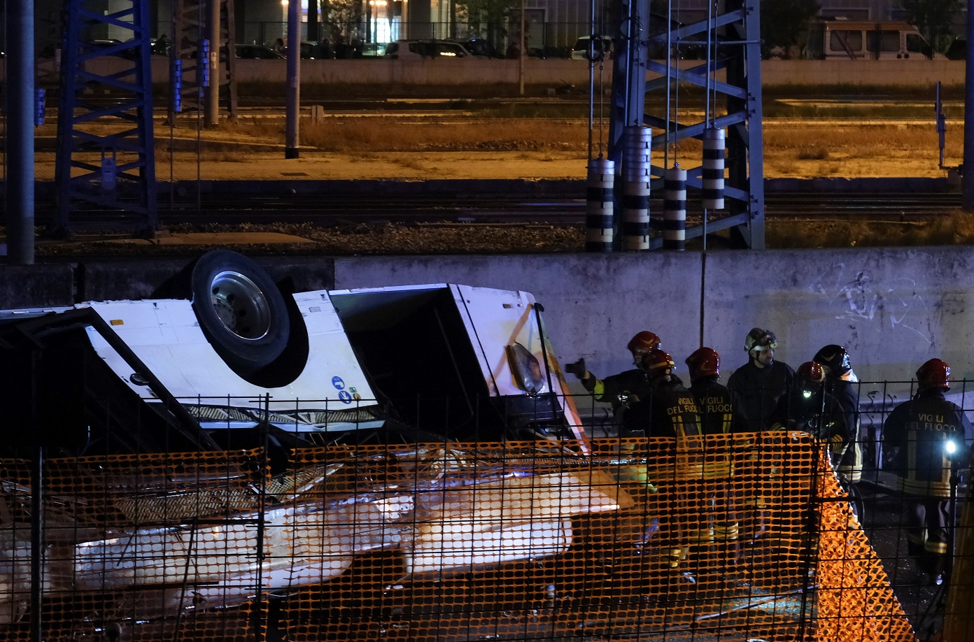 Firefighters work at the scene of the crash. Photo: Reuters