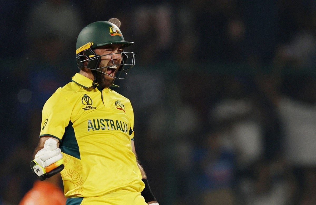 Australia's Glenn Maxwell celebrates after reaching his century against the Netherlands. Photo:...