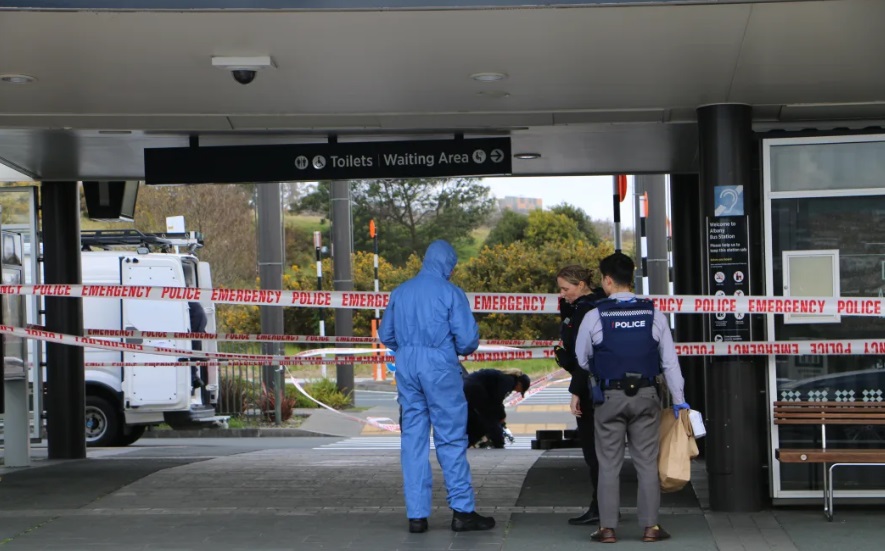 Police at Albany Bus Station following the incident. Photo: RNZ