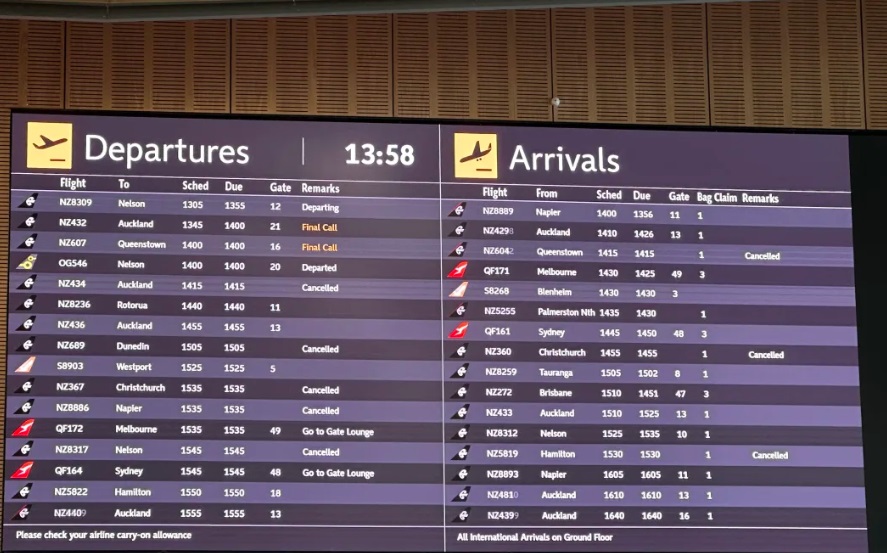 Arrivals and departures board at Wellington Airport showing a number of cancelled flights yesterday. Photo: RNZ 