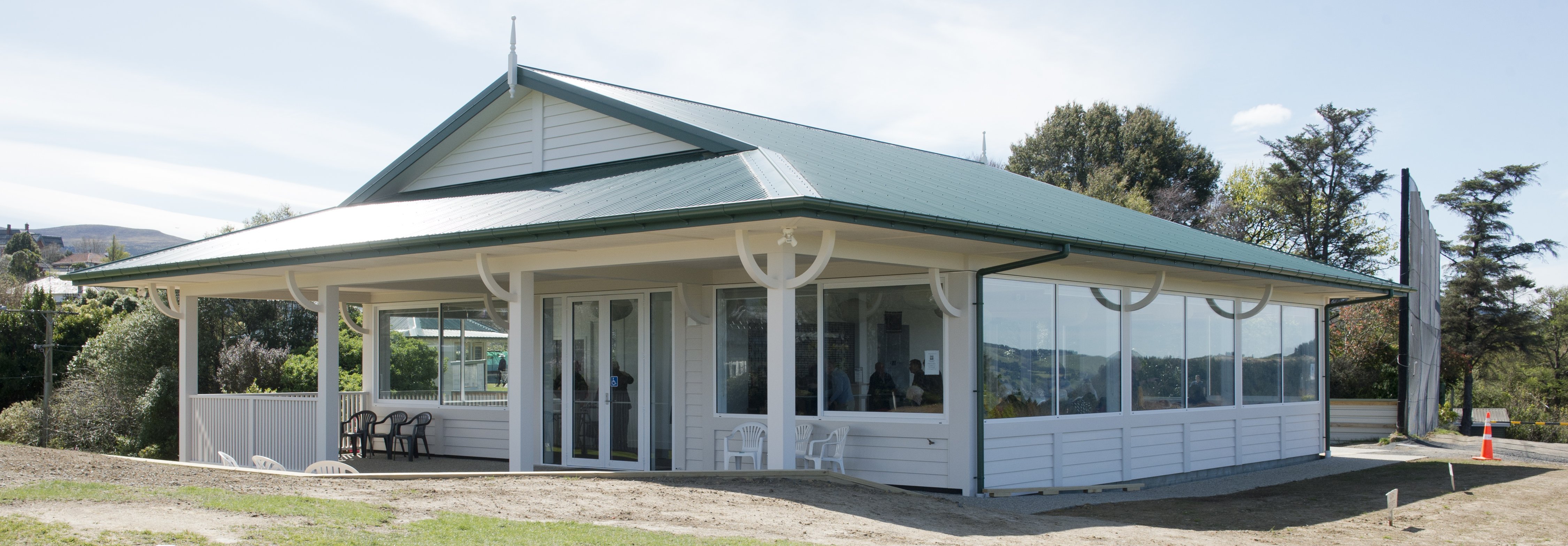 The new Belleknowes Golf Clubhouse stands elevated with views of St Clair and Otago Harbour....