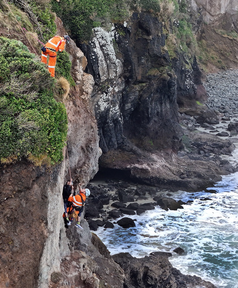 Dunedin Land Search and Rescue volunteers Matteo Scoz and Andrew Duncan assist a man trapped on a...