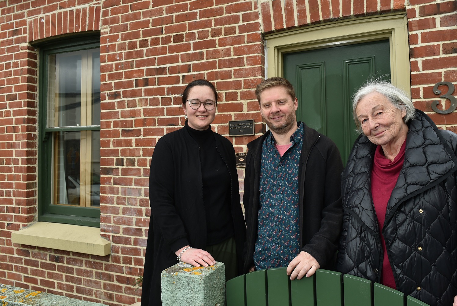 Vanessa Manhire (left), Chris Brickell and Nonnita Rees MNZM at the Robert Lord Writers Cottage,...